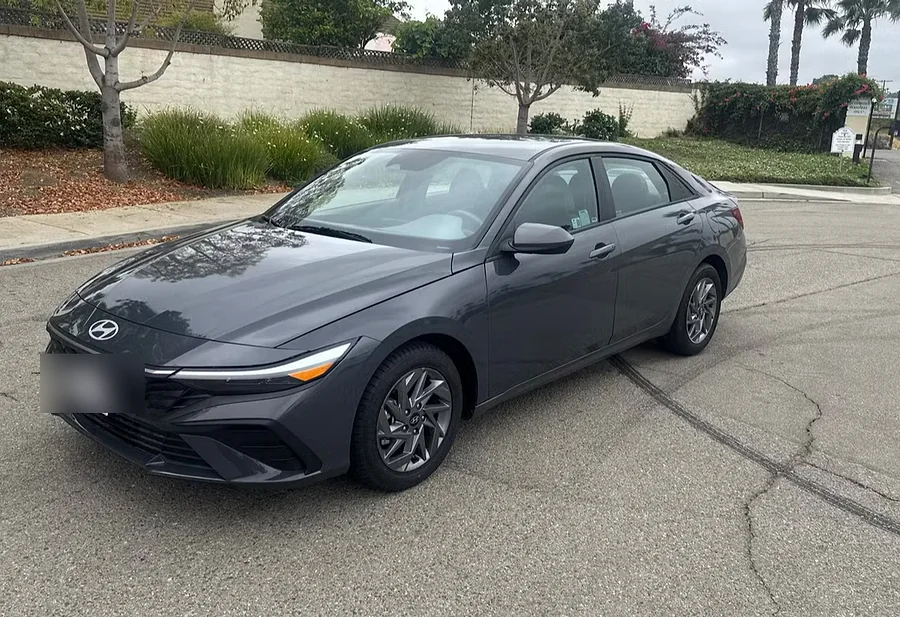 Grey Hyundai Elantra sedan on a residential street in Oceanside